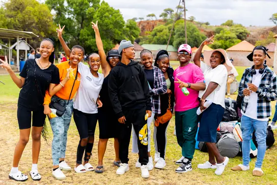 A group of campers posing together outdoors
